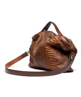 Large and very light handbag in genuine python skin in camel color.
