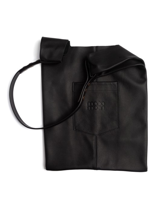 Soft and lightweight leather bag with adjustable strap that mimics plastic shopping bags.