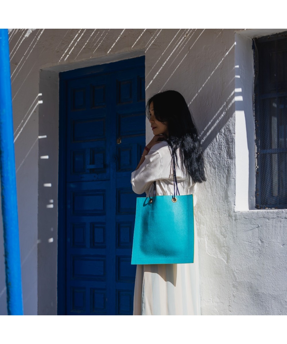 Square leather bag with leather cord handles