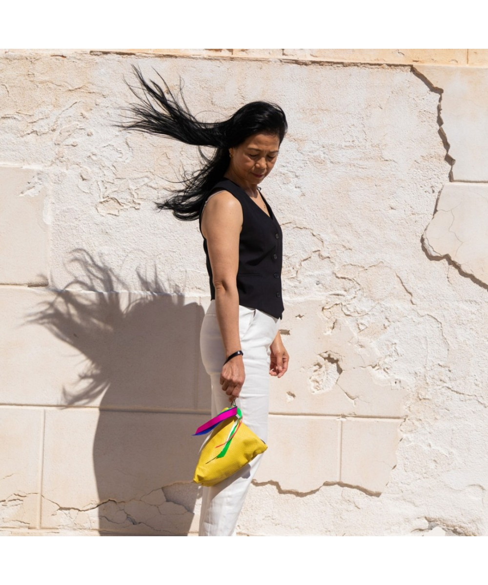 Handbag with strap.