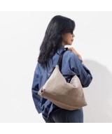 Leather backpack bag with a glossy finish.