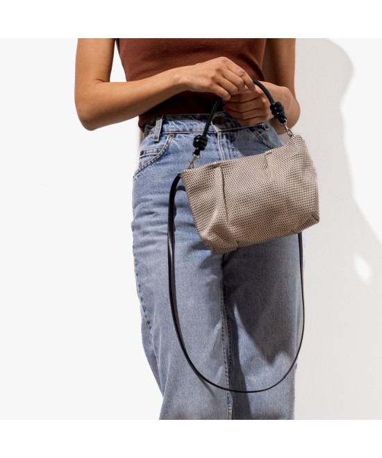 Sand-colored shiny leather handbag