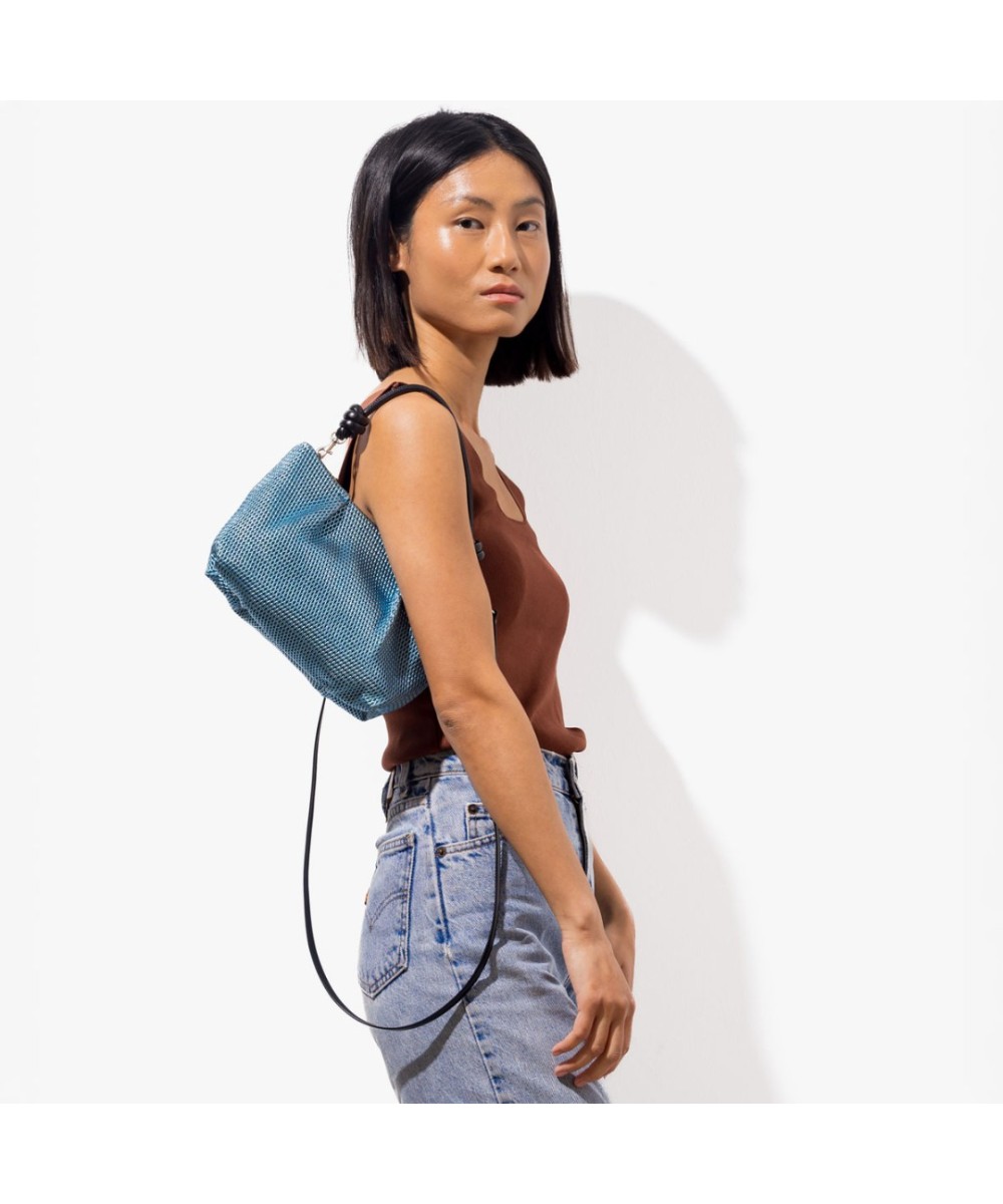 blue shiny leather handbag