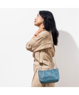 blue shiny leather handbag
