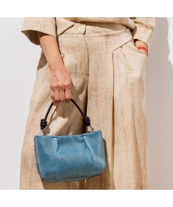blue shiny leather handbag