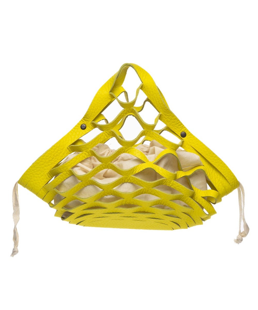 Cesta de piel plegable amarilla.