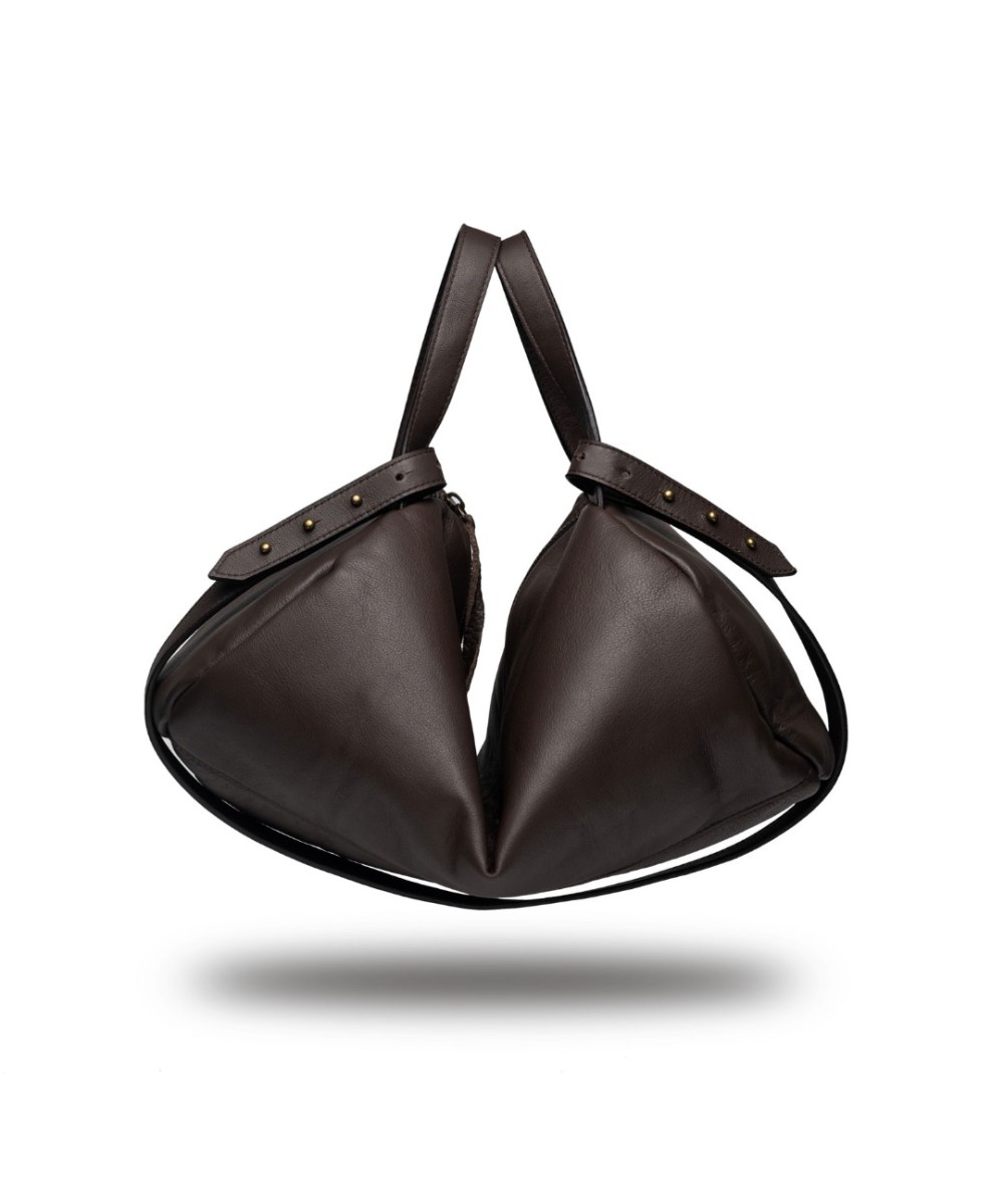 Unisex leather shoulder bag with handles and strap to cross-shoulder.