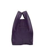 Bolso de piel suave y ligero con correa regulable que imita a las bolsas de plastico del supermercado