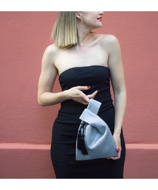 Leather handbag inspired by plastic bags.