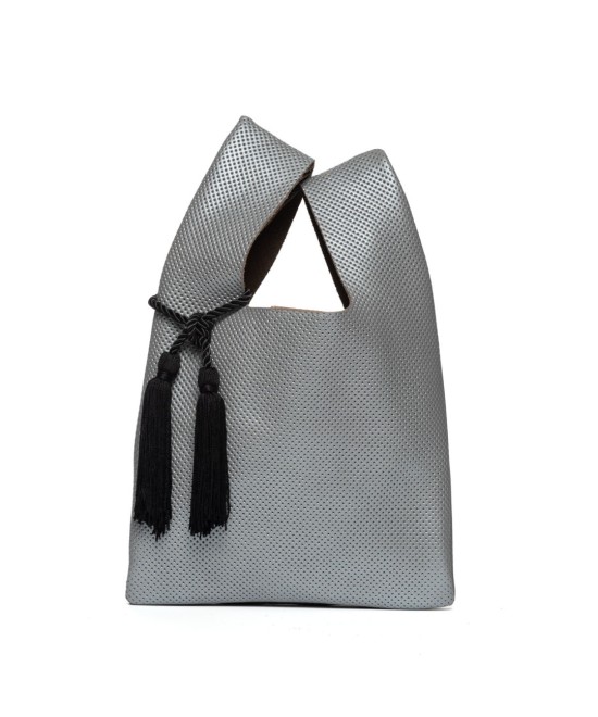 Leather handbag inspired by plastic bags.