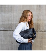 Soft and light leather bag to hang on the shoulde