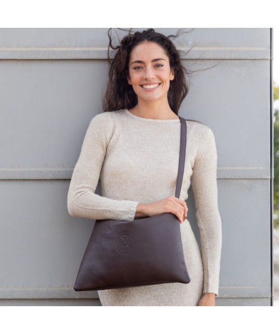 Large leather bag with adjustable strap.