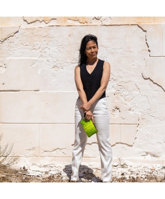 Handbag with strap.