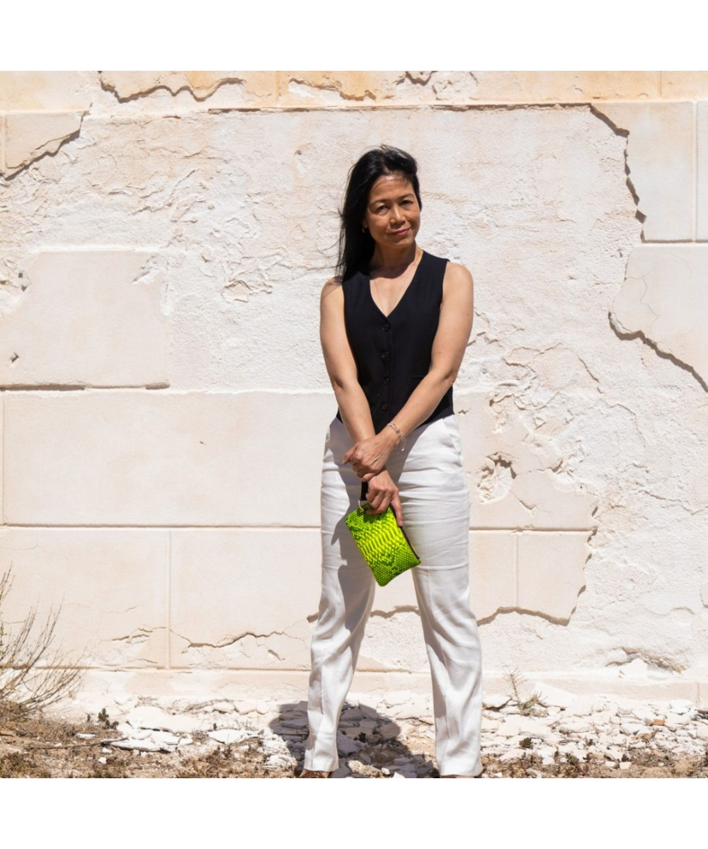 Handbag with strap.