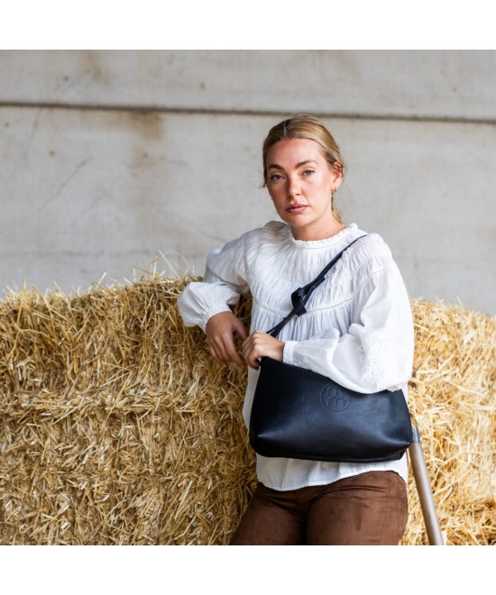 bolso de piel negro con correa adaptable