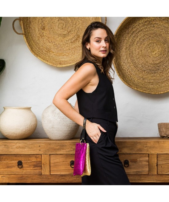 Handbag with strap.