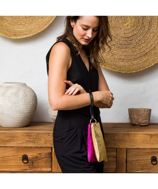 Handbag with strap.