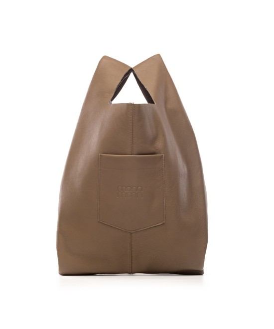 Soft and lightweight leather bag with adjustable strap that mimics plastic shopping bags.
