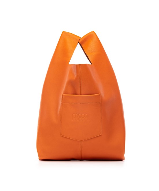 Soft and lightweight leather bag with adjustable strap that mimics plastic shopping bags.
