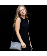 Leather bag made up of 2 interchangeable individual flat wallets.