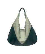 Bolso Hobo bicolor en tonos azules.