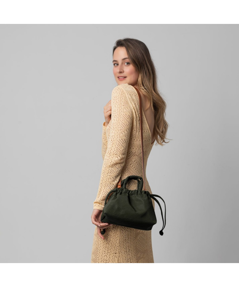 Small green bag with handles and strap to cross