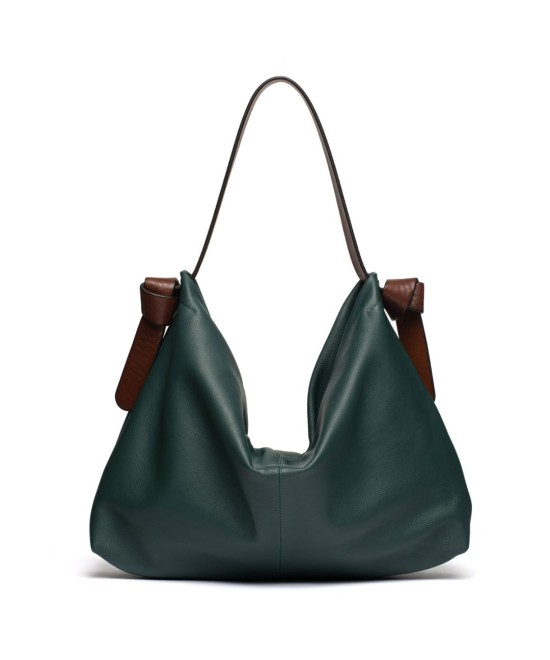 Soft and light green leather bag with a leather colored strap