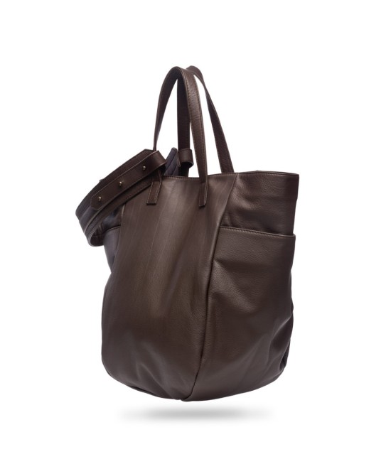 Multi-position bag with outer pockets, short handles and long adjustable strap. Brown leather