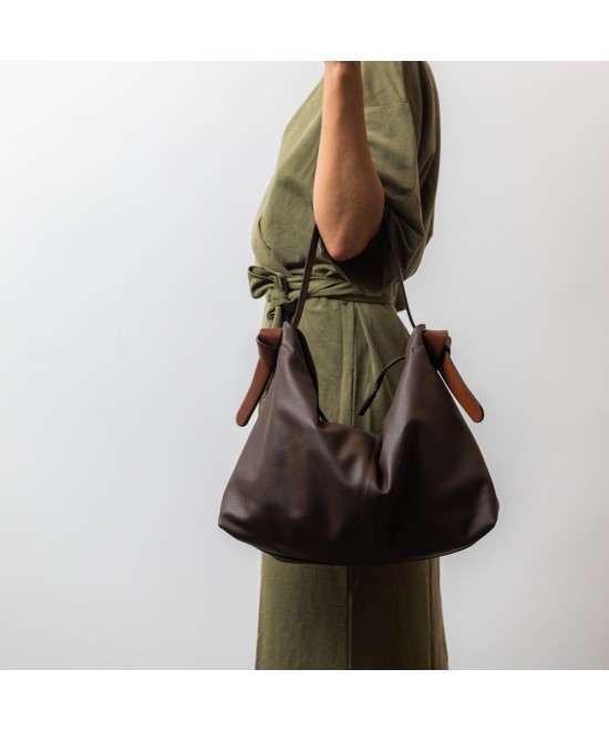Soft and light black leather bag with a leather  strap