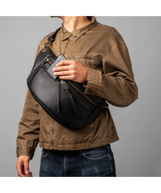 Riñonera grande tipo mochila para cruzar a la espalda. Unisex