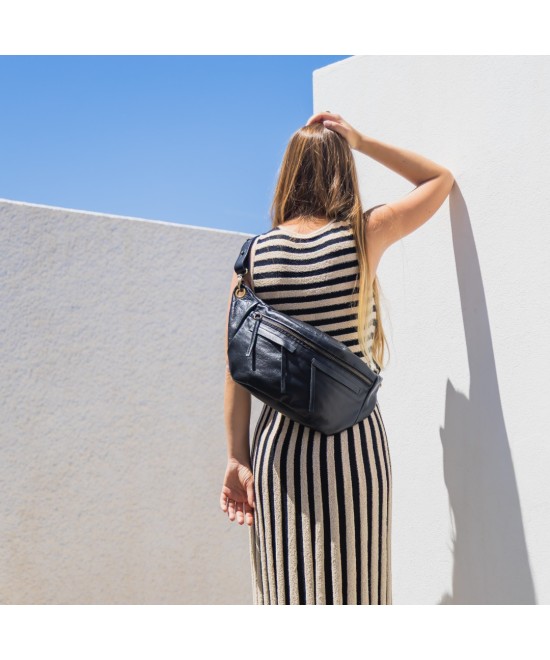 Riñonera grande tipo mochila para cruzar a la espalda. Unisex
